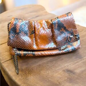 Henri Bendel Orange Snake Print Wristlet Clutch Bag